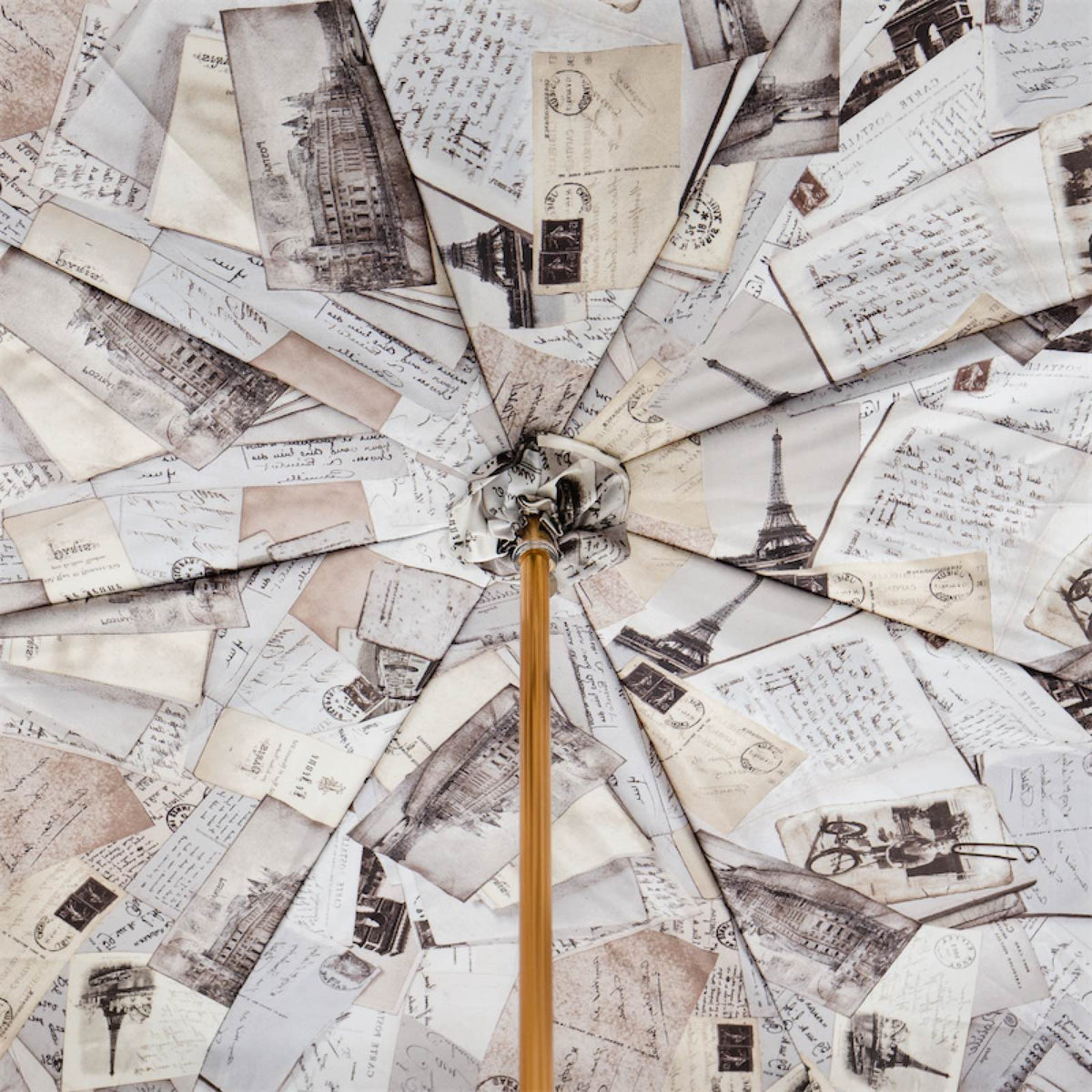 Inside of the double canopy: vintage postcards and letters with views of Paris and the Eiffel Tower