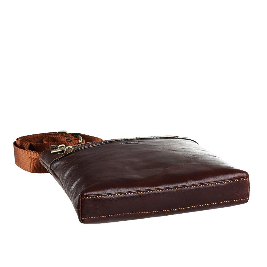 Tony Perotti Italico 6048 dark brown bag lying flat — structured bottom with contrasting stitching and jacquard strap