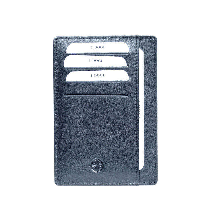 Tony Perotti Cortina 5001 navy — front face of the navy leather card holder with cards in the slots, the full-height side pocket and the embossed compass rose