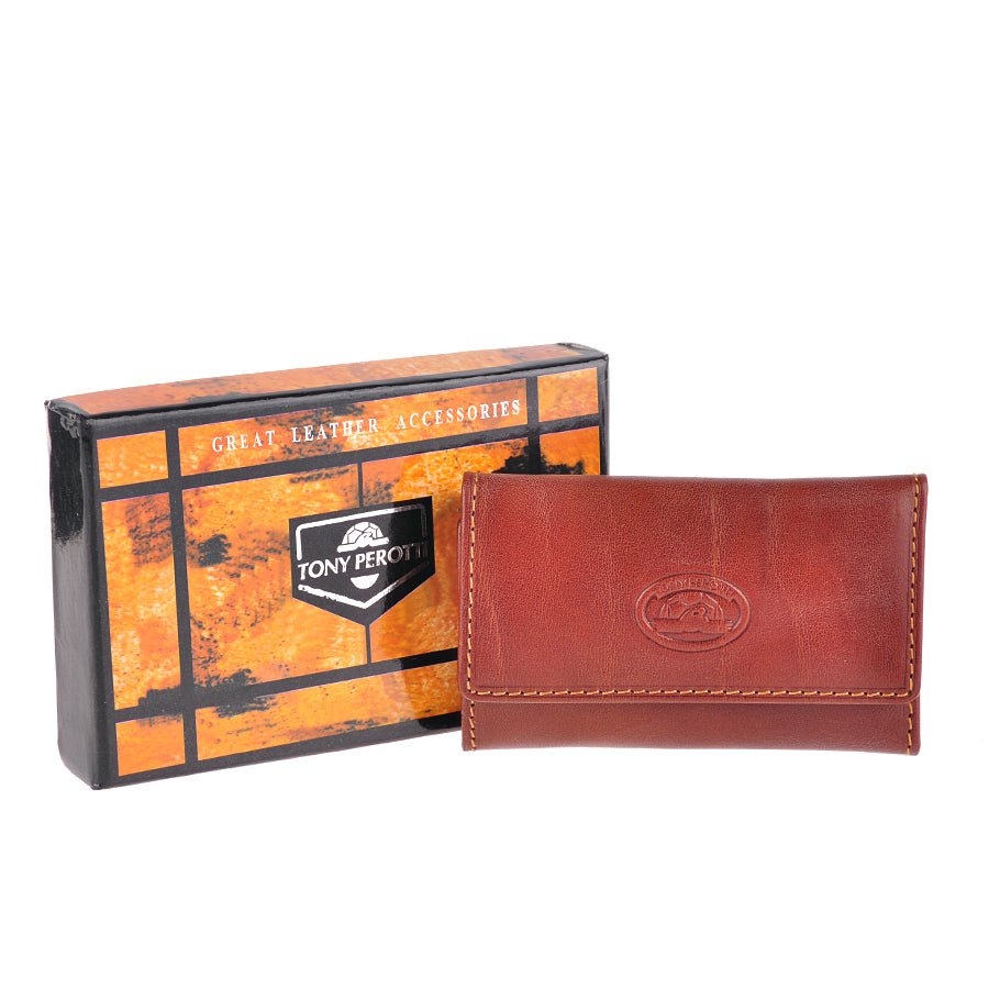 Cognac leather key case beside its branded Tony Perotti box, handcrafted in Italy — Italico 1117 cognac