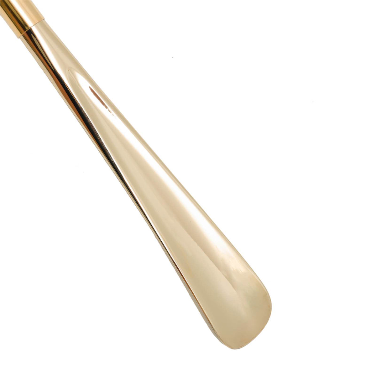 Glossy gold-tone shoehorn blade, close-up