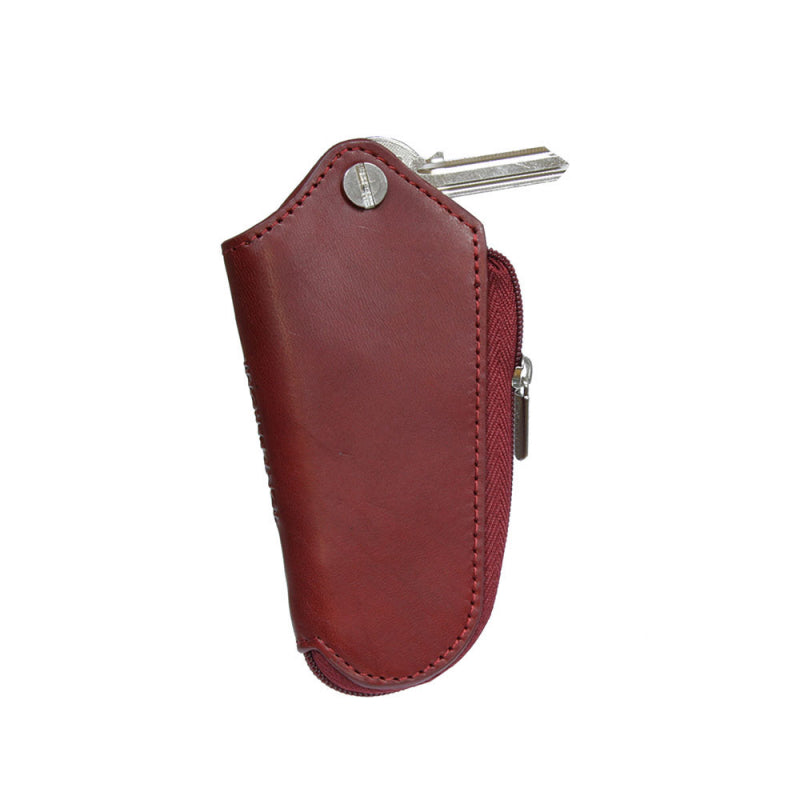 Tony Perotti Nevada 2694 rosso — a key pulled up out of the top of the sheath, the rest of the bunch still covered