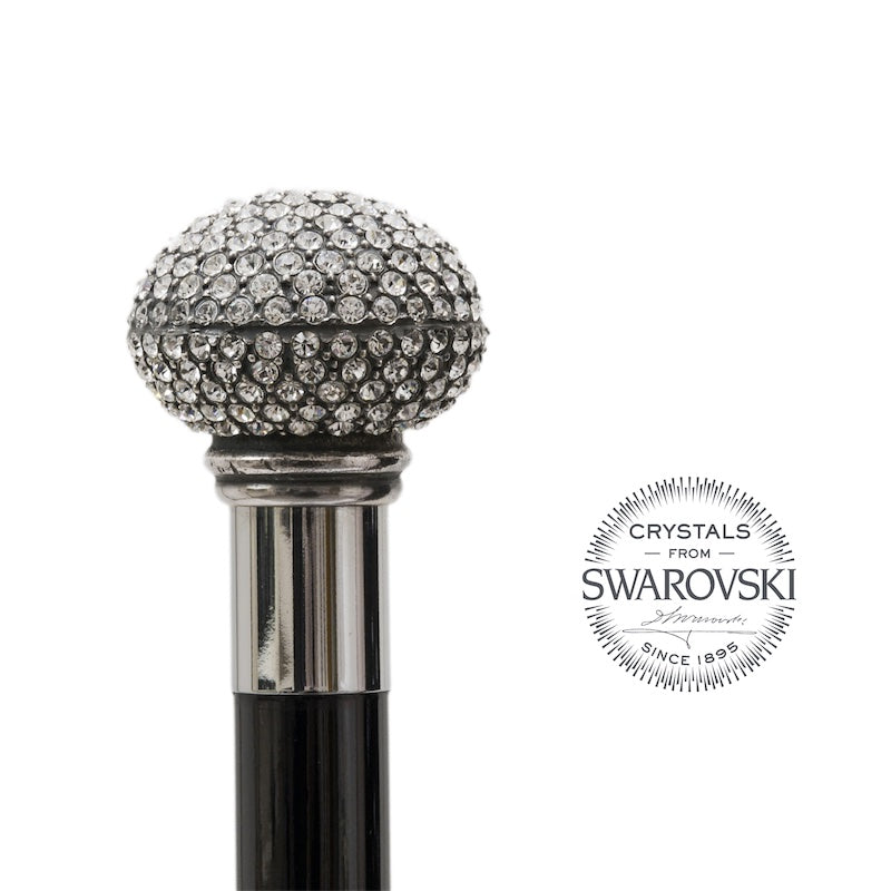 Round crystal knob on a polished silver-tone collar above the glossy black shaft