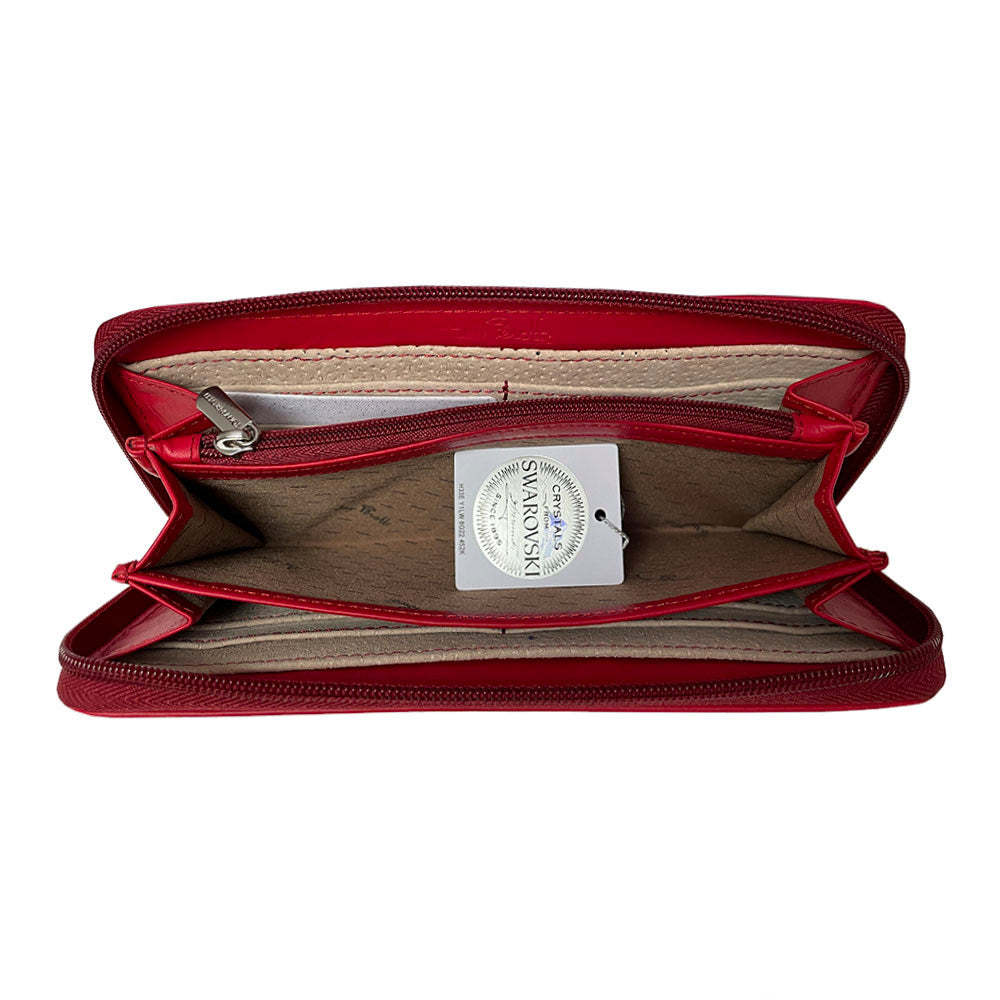 Interior of the red Swarovski 3160 wallet with banknotes lying flat