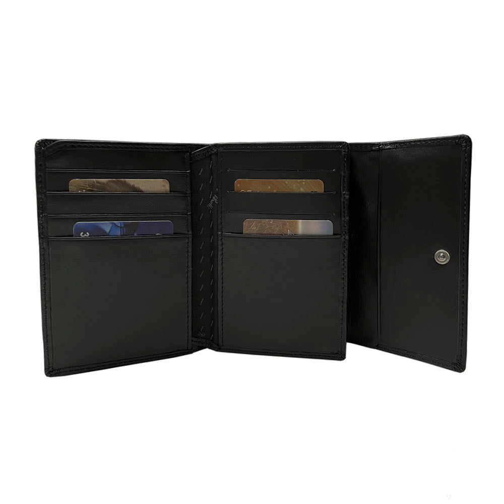 Interior of the black Swarovski 500N wallet with snap coin pocket and banknotes