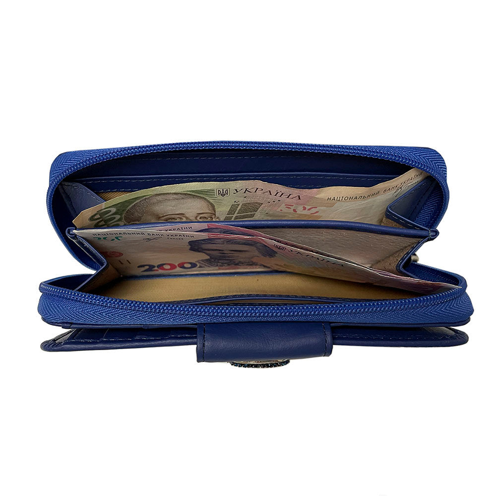 Zip-around bill section of the blue Swarovski 1655A wallet with unfolded banknotes