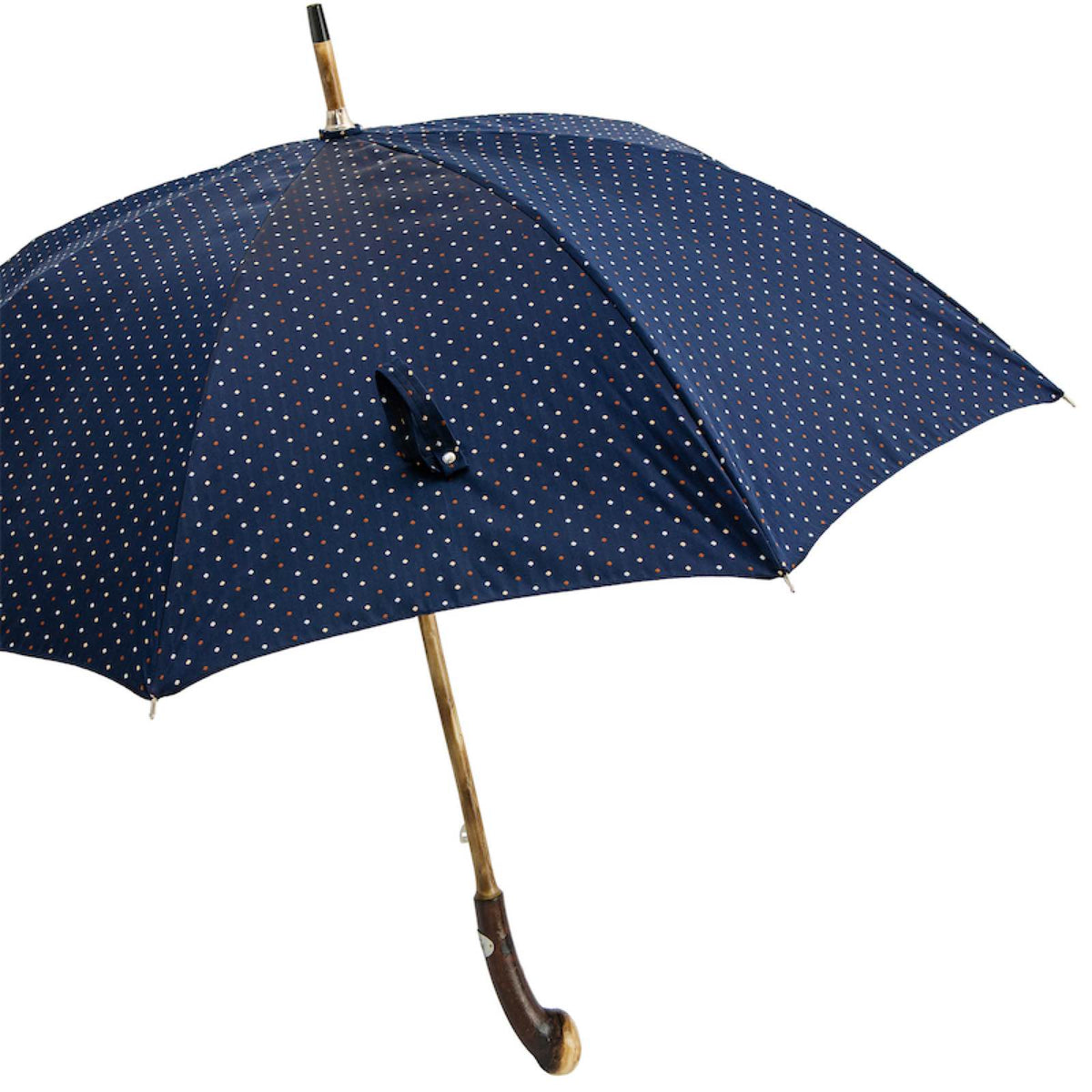Open navy fine-dot umbrella from the side with chestnut shaft and curved handle