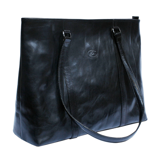Tony Perotti Italico 8225 nero black leather tote at an angle — the long handles on dark silver rings and the embossed oval badge