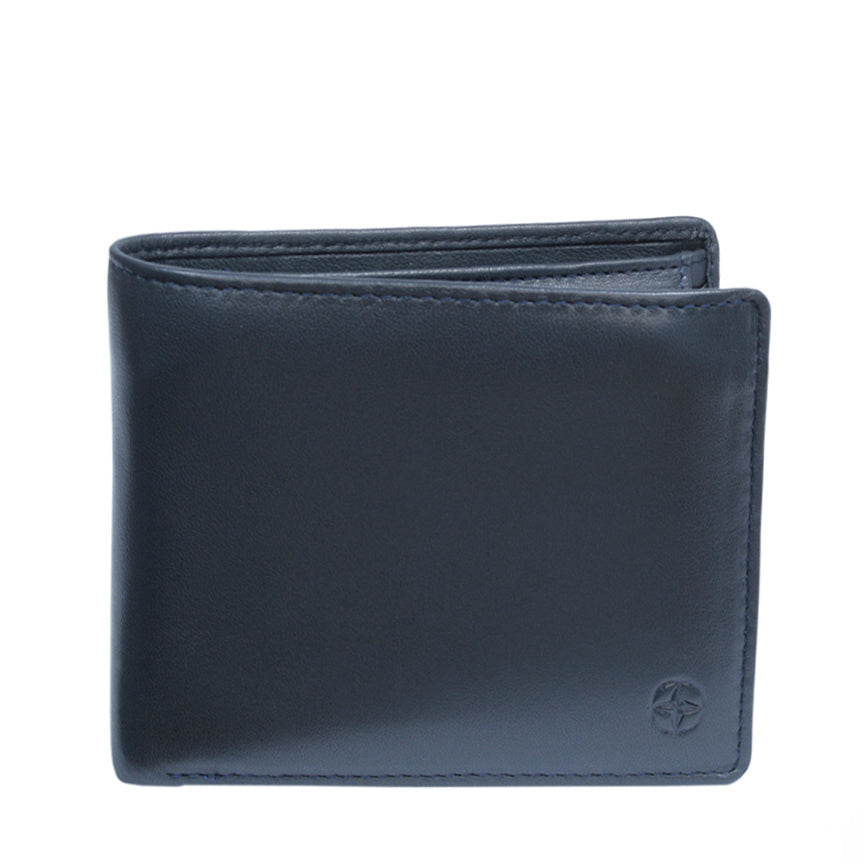 Navy Tony Perotti Cortina 5057 leather bifold wallet seen straight on, closed, with the embossed compass rose in the lower corner