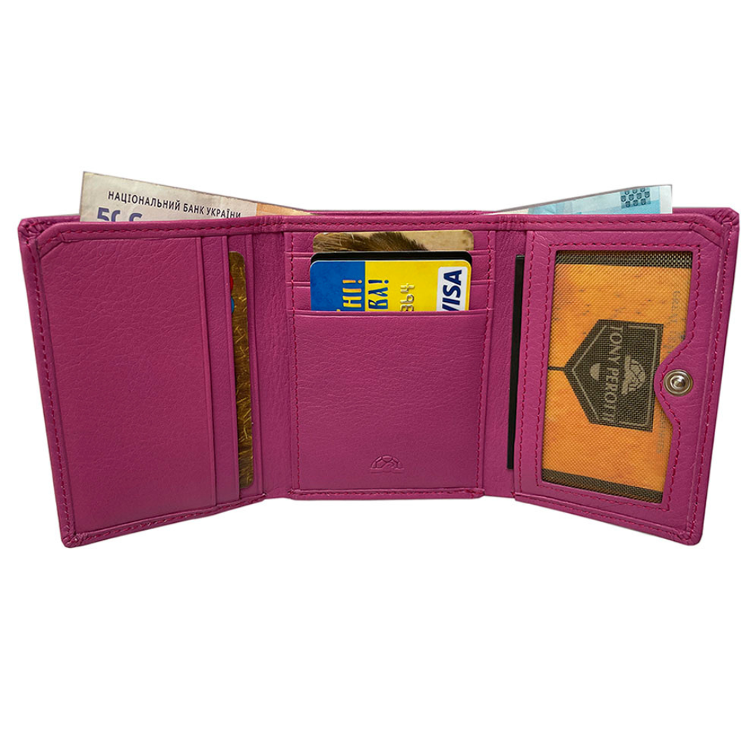 Tony Perotti pink leather wallet open with bill compartments