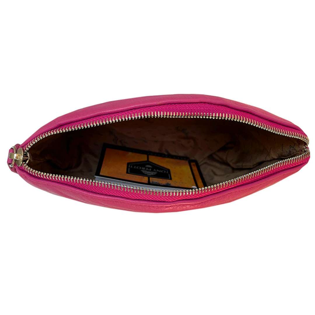 Open Tony Perotti pink leather cosmetic bag showing branded textile lining