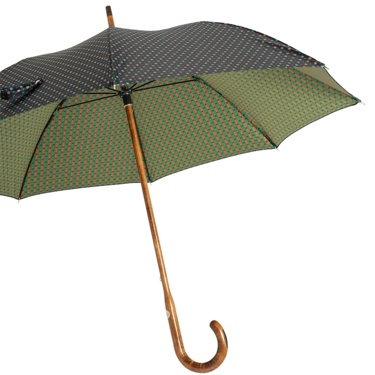 Open umbrella from the side showing the green and amber striped weave underneath and the maple shaft