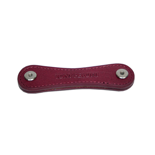 Tony Perotti Nevada KR-198 rosso — deep red leather key organiser closed, «TONY PEROTTI» embossed between the two screw posts
