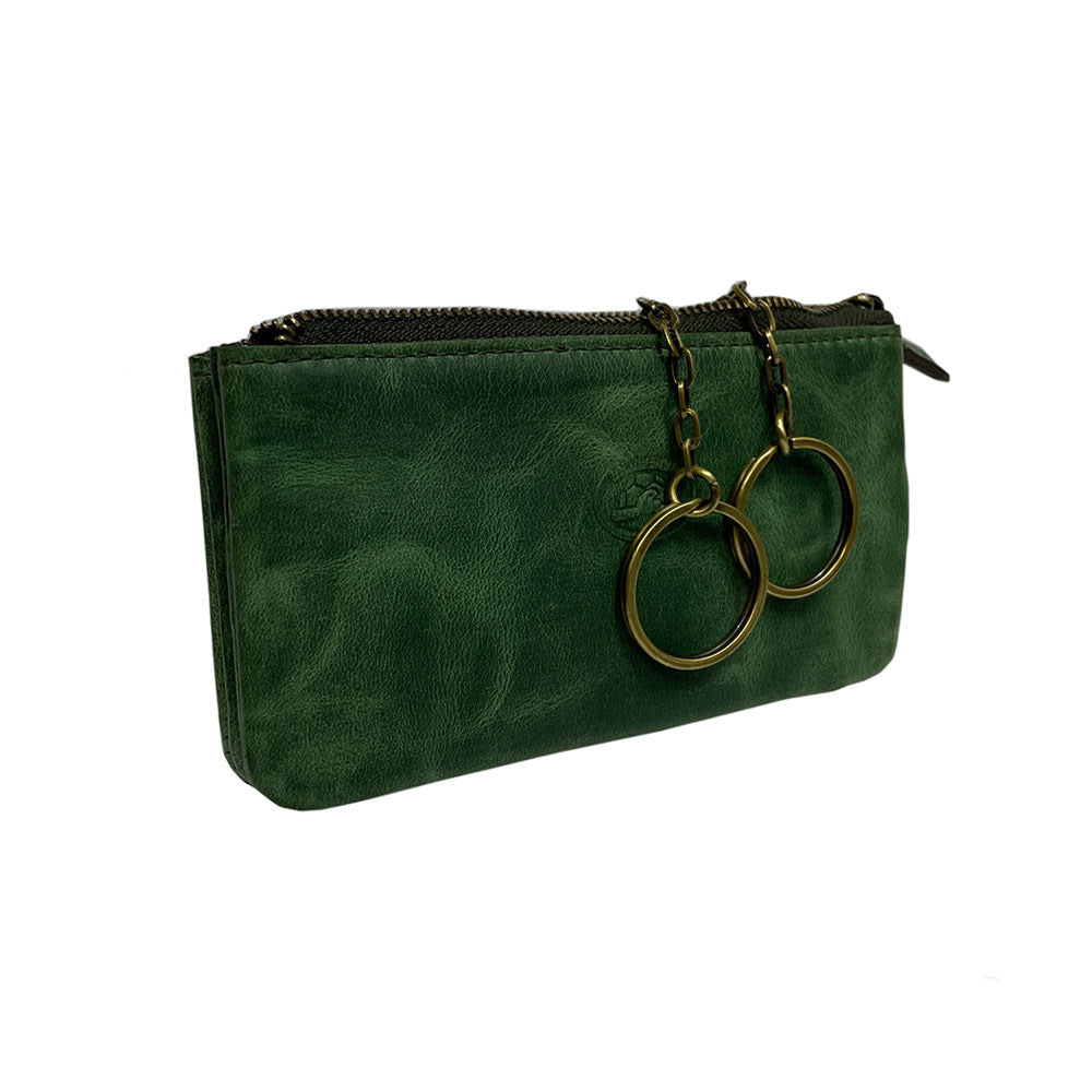 Green Arno 3350 key case at an angle — flat zip pouch with the two key rings hanging from their brass chains
