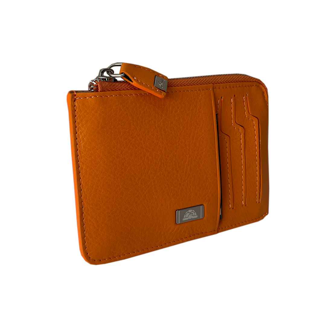 Tony Perotti orange card holder — angled back view with zip pocket