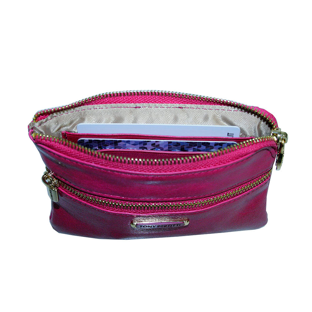 Tony Perotti Topkapi 3461 geranio — the top zip open, showing the brand-print lining inside