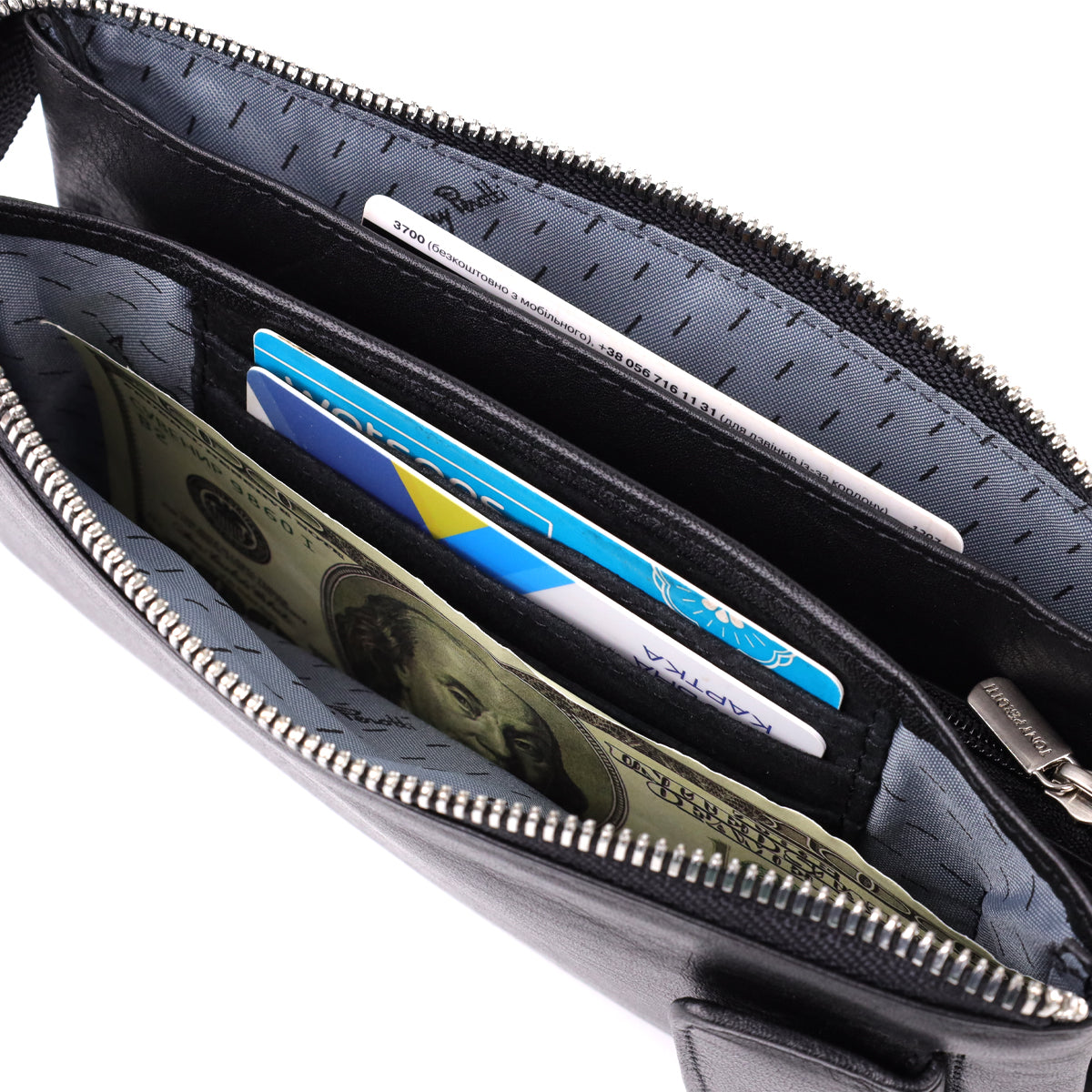 Inside the Tony Perotti New Contatto 2651 nero — card slots filled and banknotes laid flat