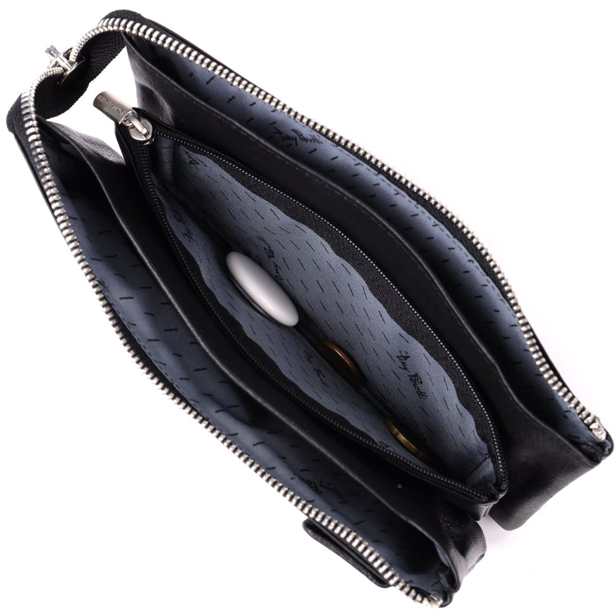 Zipped coin section of the New Contatto 2651 nero opened between the two banknote compartments