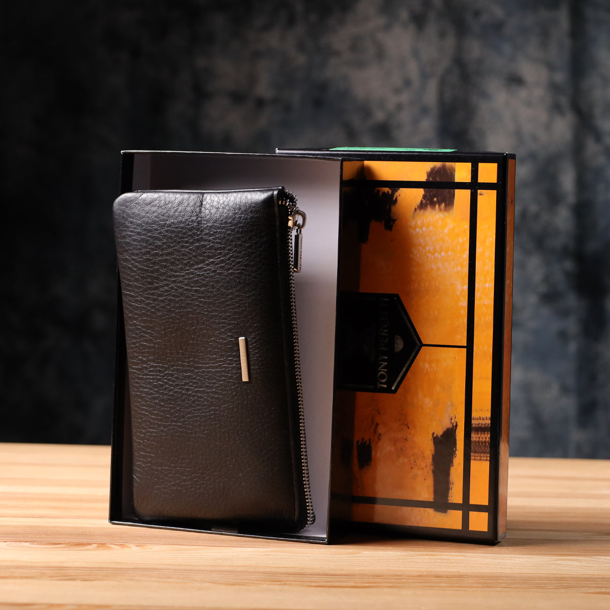 Tony Perotti New Contatto 2651 nero clutch wallet in its open Tony Perotti box