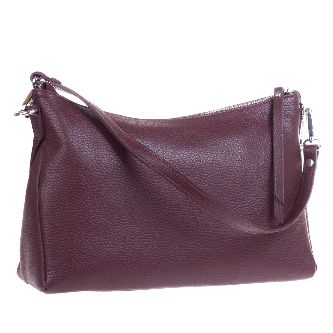 Tony Perotti Borsa CA01A-18BO women's burgundy leather shoulder bag at an angle on its short strap — pebbled floater leather and a zip along the top