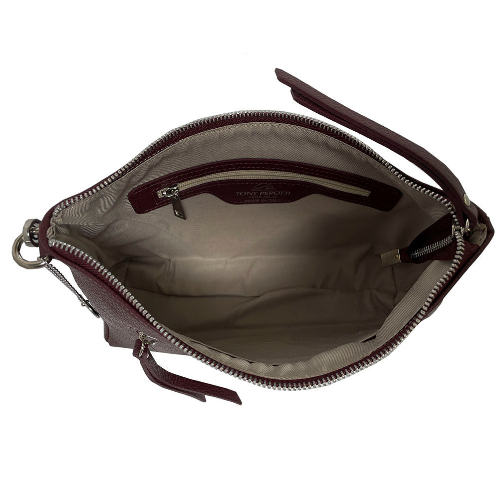 Inside the Tony Perotti Borsa CA01A-18BO burgundy leather bag — one compartment in taupe textile with a zipped wall pocket and the Tony Perotti Vera Pelle Made in Italy label