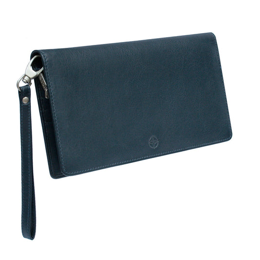 Tony Perotti Cortina 5067 navy dark blue leather clutch wallet closed at an angle — flap front with the embossed compass rose and the detachable leather wrist strap on a dark silver snap hook