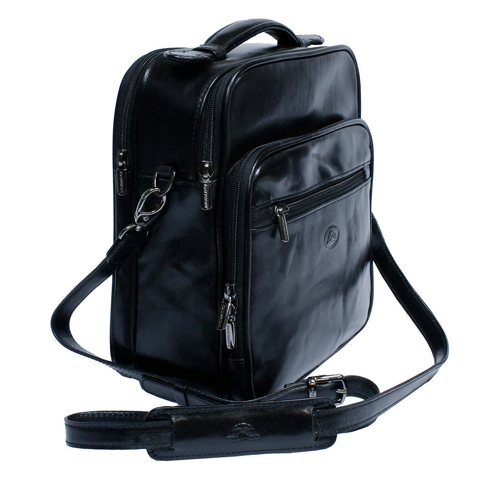 Angled view of the Tony Perotti Italico 7058 black bag with the leather shoulder strap and padded shoulder rest
