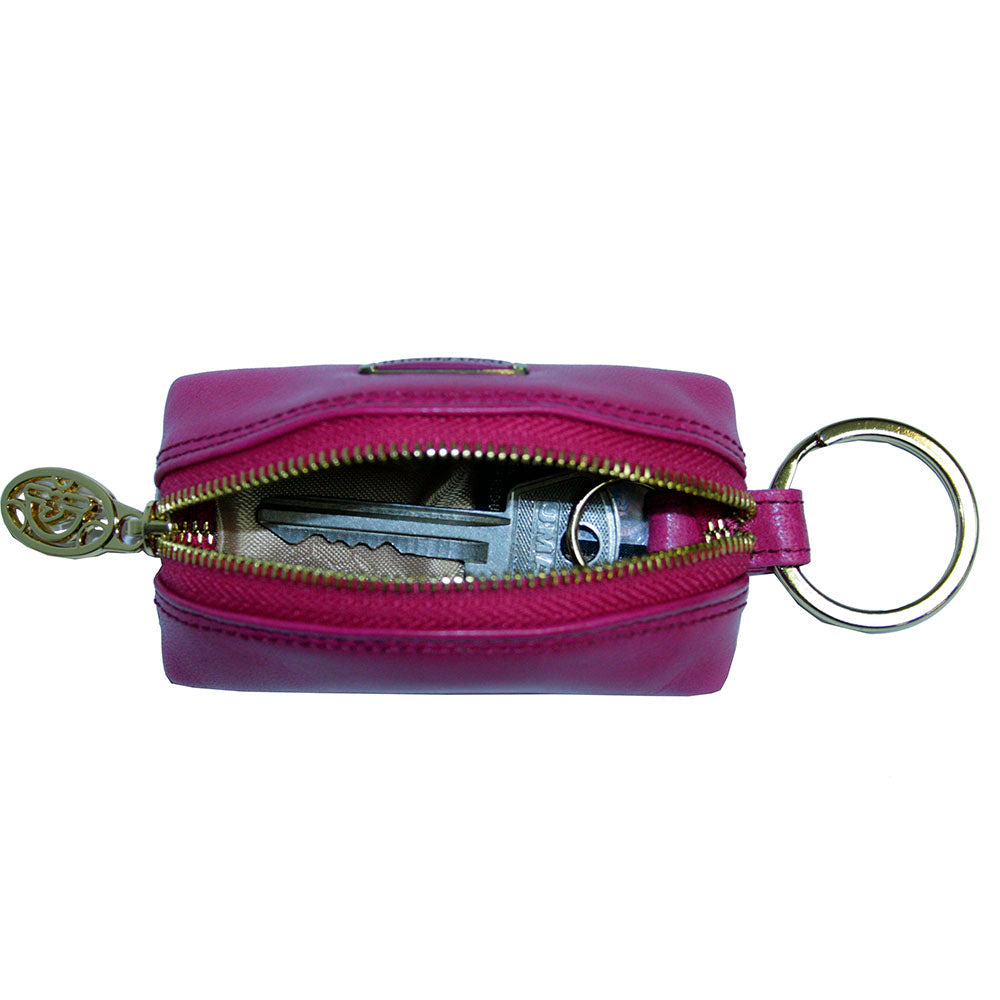 Tony Perotti Topkapi KR-186 geranio — the case unzipped with a car key and fob inside, showing the light grey lining and the split ring on its leather tab