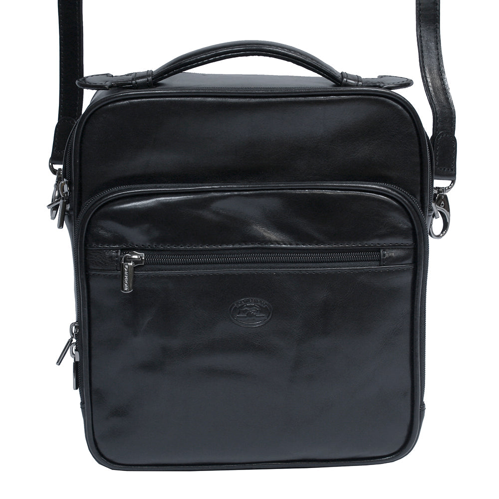 Tony Perotti Italico 7058 black shoulder bag hanging on the detachable strap — front zip pocket and embossed turtle emblem