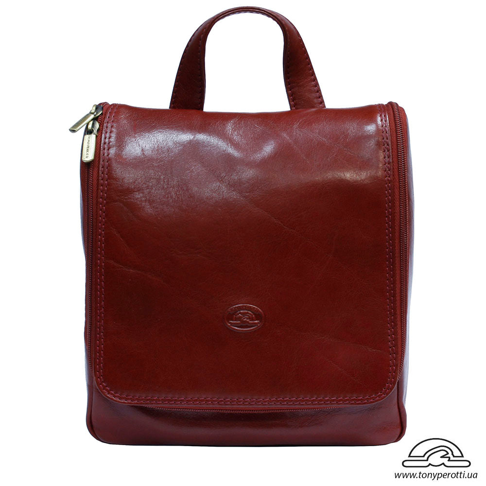 Tony Perotti Italico 8220 rosso toiletry bag — front view with embossed turtle emblem on the flap