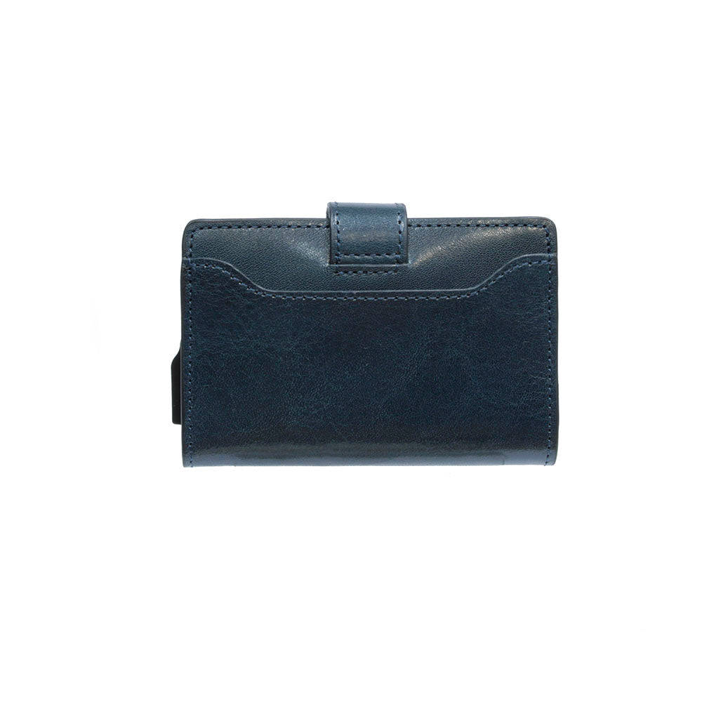 Tony Perotti Nevada 3776 navy — angled view of the navy leather cover and the metal pop-up case at the base