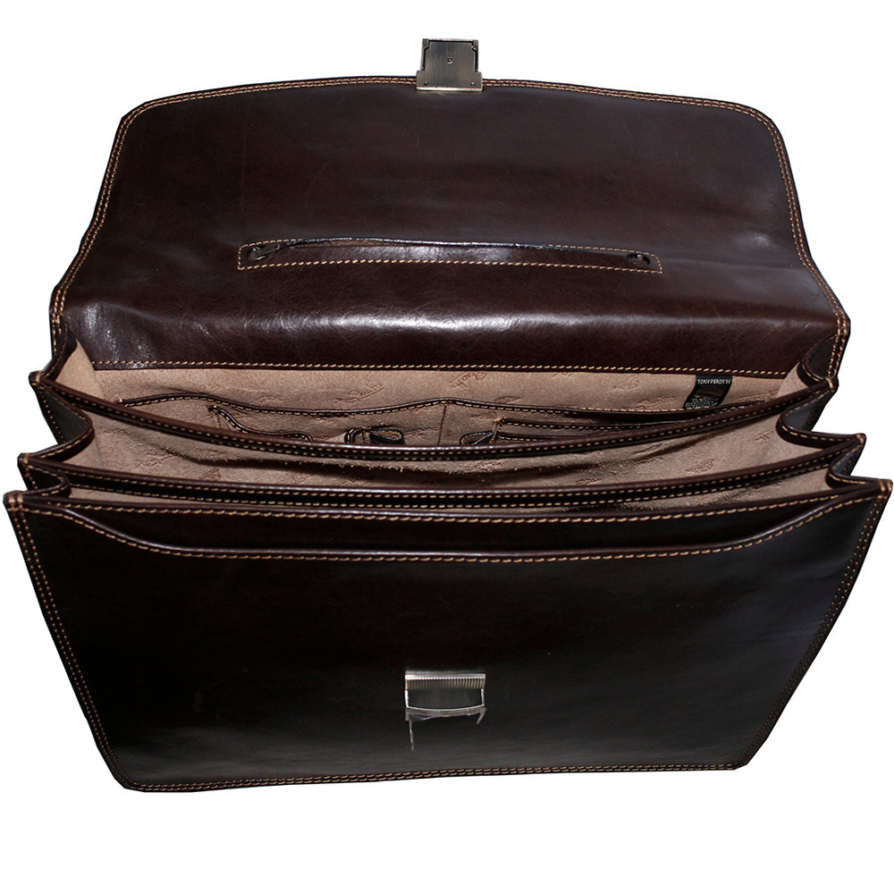 Italico 8009 moro opened — three compartments split by leather partitions, branded lining printed with the repeating Tony Perotti mark and a zip pocket in the flap