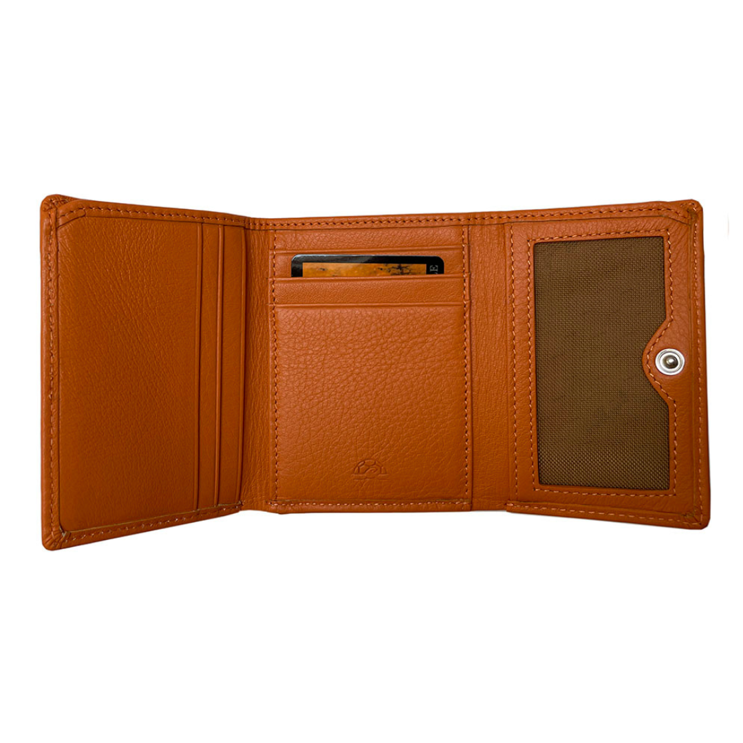 Open orange Tony Perotti wallet showing coin pocket and interior compartments