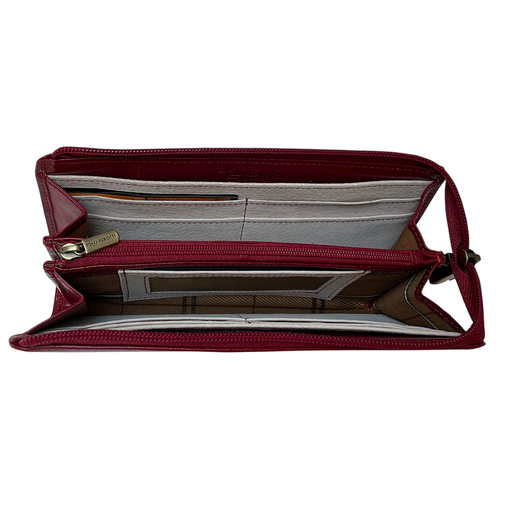 Open Tony Perotti red zip wallet showing interior compartments and card slots