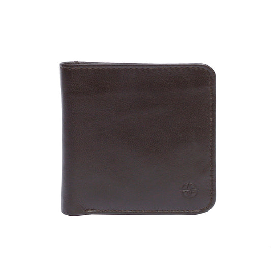 Dark brown Tony Perotti Cortina 5019 small square bifold wallet seen straight on, closed, with the embossed compass rose in the lower corner