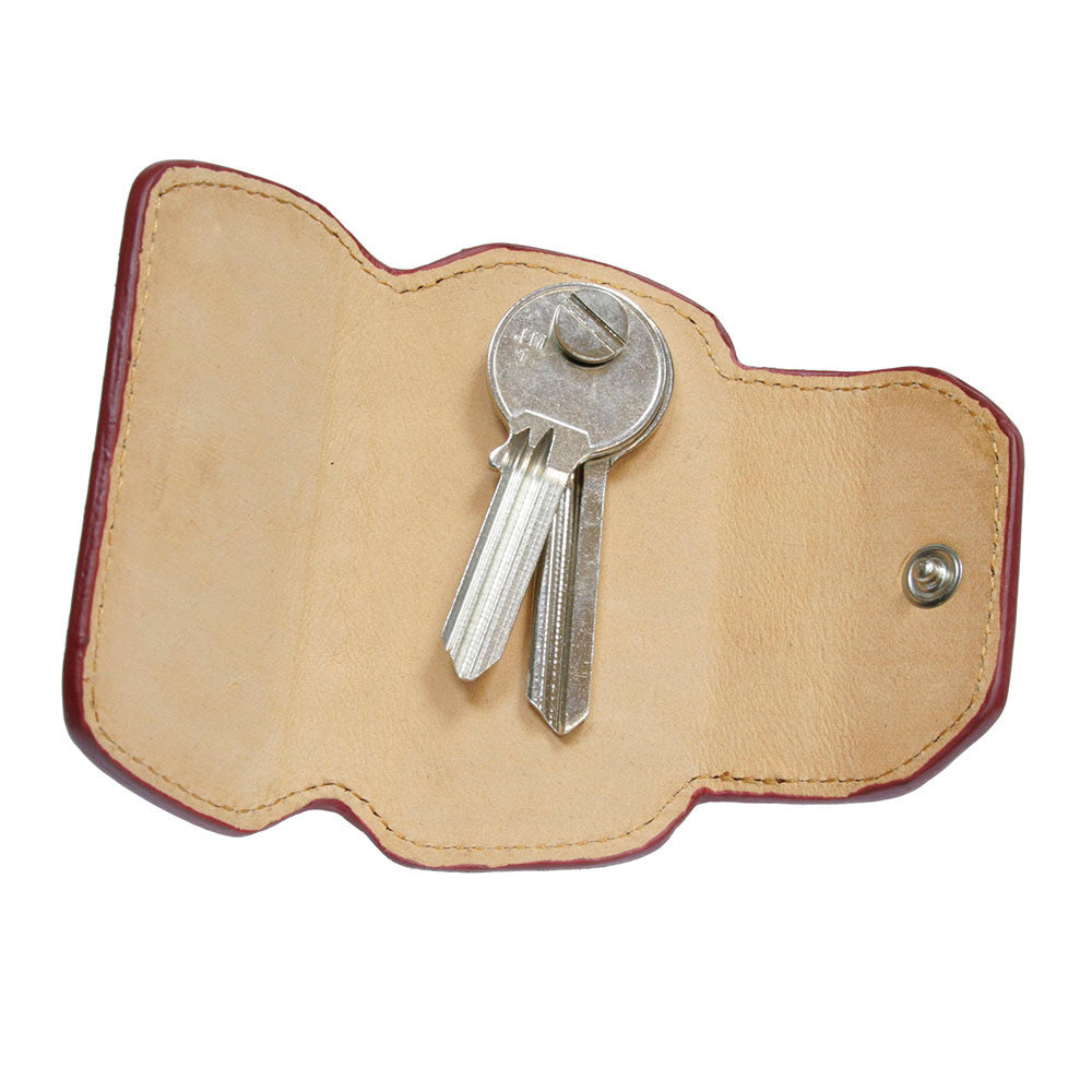 Tony Perotti Nevada KR-199 rosso — opened flat: natural undyed leather inside and two keys bolted to the screw post in the middle