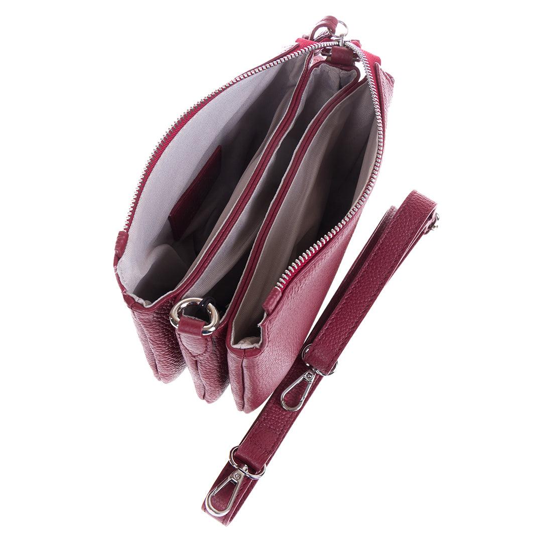Tony Perotti Borsa CA04B-30DR red leather bag open beside its detachable narrow leather strap, with a card slot visible in one compartment