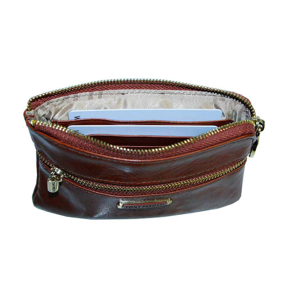 Tony Perotti Topkapi 3461 ambra — the top zip open, showing the brand-print lining inside