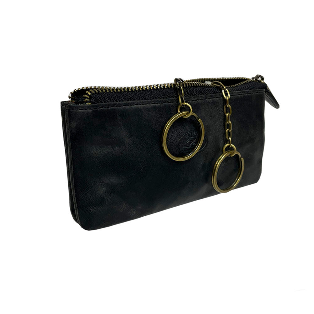 Black Arno 3350 key case at an angle — flat zip pouch with the two key rings hanging from their brass chains