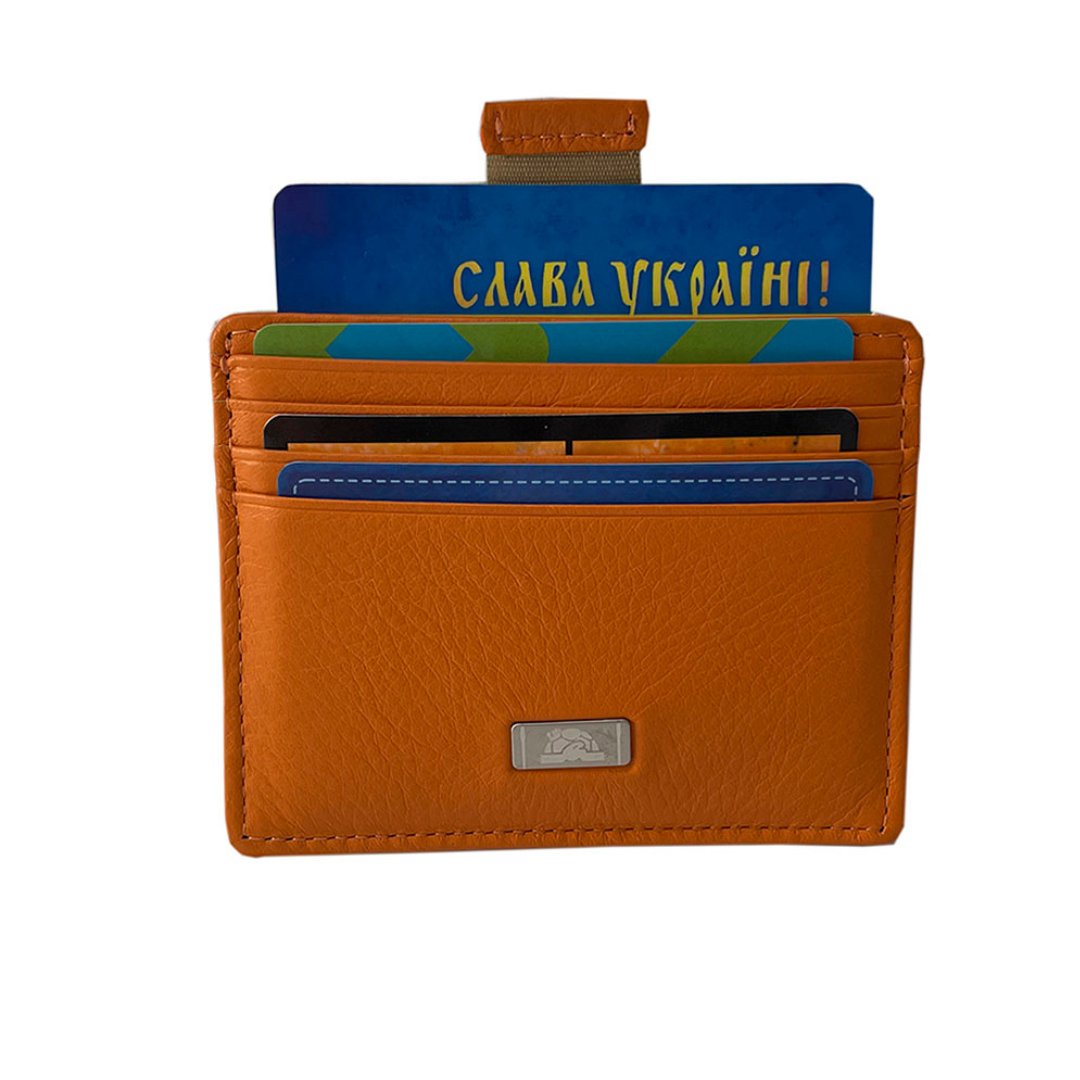 Orange leather card holder Tony Perotti Contatto 2236N arancio filled with cards and the central compartment lifted by its woven pull strap