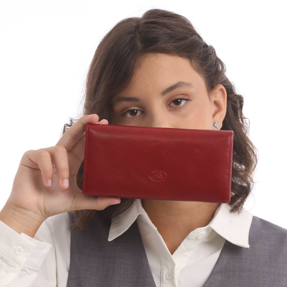 Model holding the red Tony Perotti Cortina 5072 flap wallet