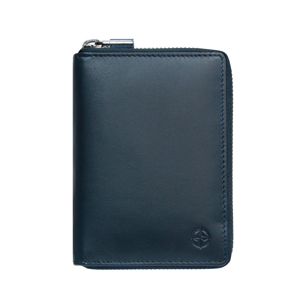 Navy Tony Perotti Cortina 5086 compact zip-around wallet seen straight on, closed, with the embossed compass rose in the lower corner