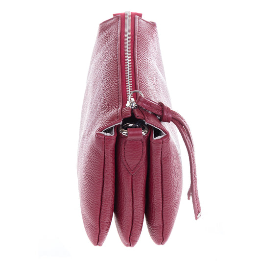End of the Tony Perotti Borsa CA04B-30DR red leather bag, showing the three compartments inside and the silver ring the strap clips to