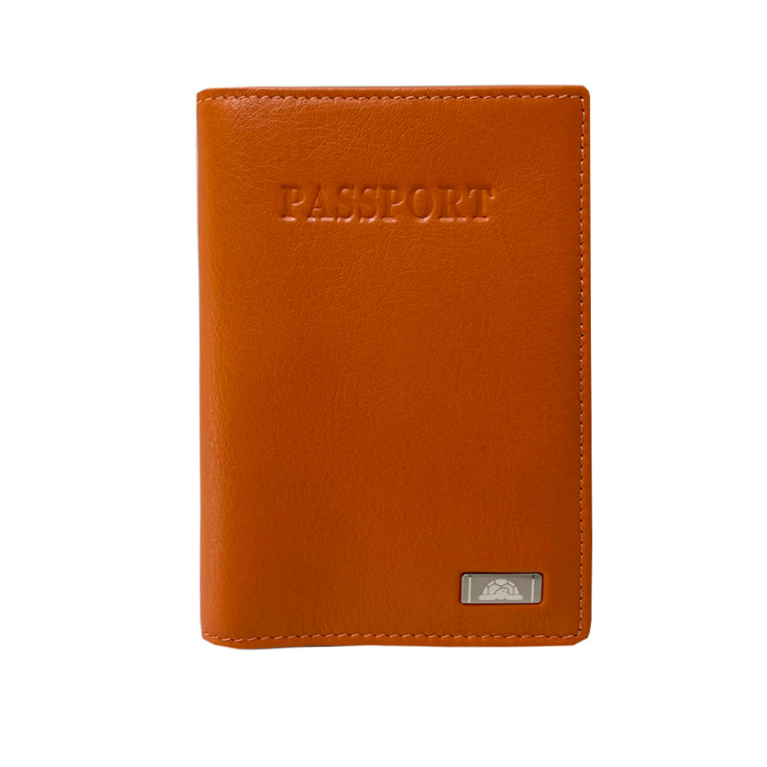 Orange leather passport cover Tony Perotti Contatto 2241 arancio — front with embossed PASSPORT lettering and the metal turtle emblem plate