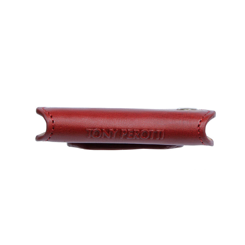 Tony Perotti Nevada KR-199 rosso — seen edge-on, showing how flat it folds and the «TONY PEROTTI» embossing