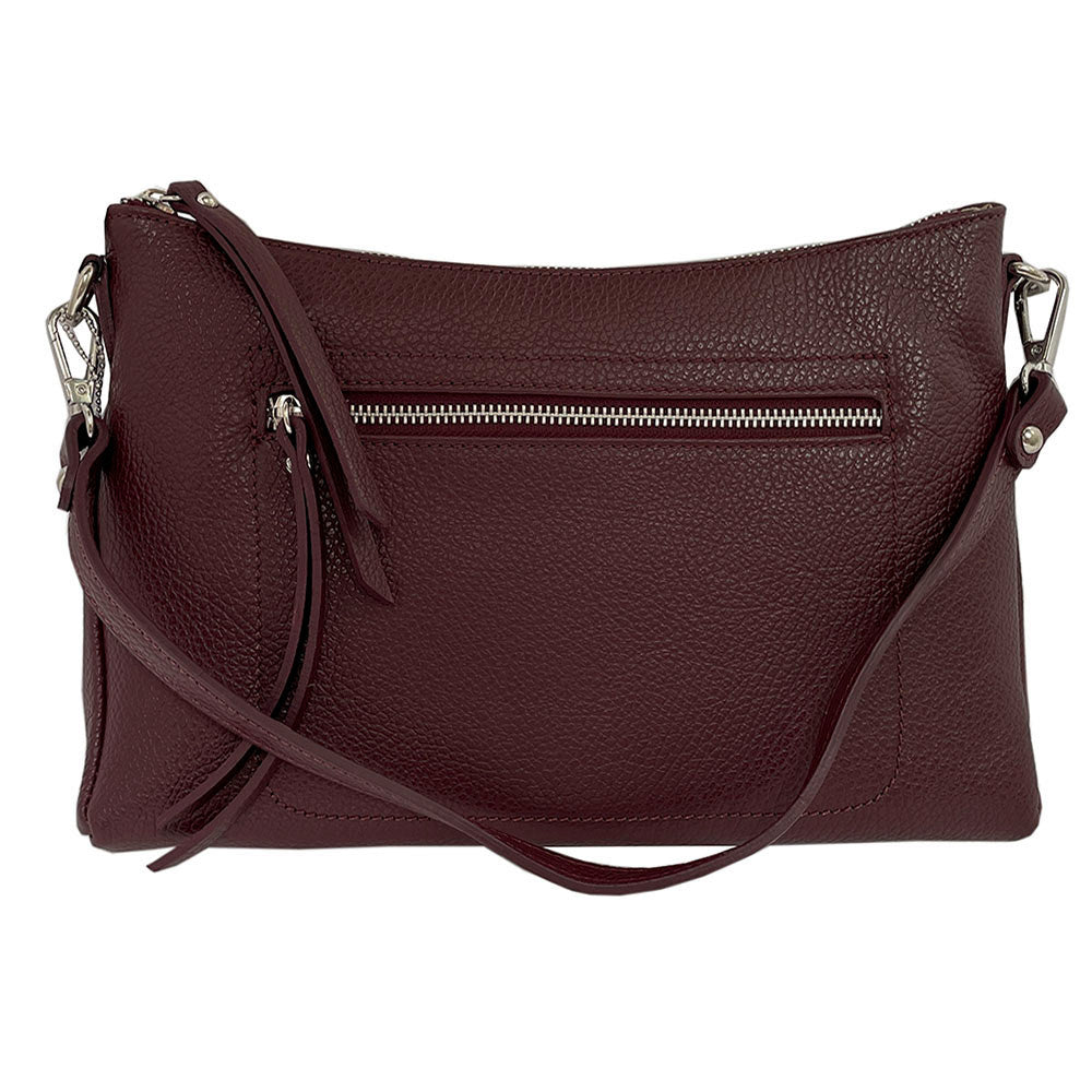 Tony Perotti Borsa CA01A-18BO burgundy leather bag seen from the front with the long strap hanging down and the zipped outer pocket across the panel