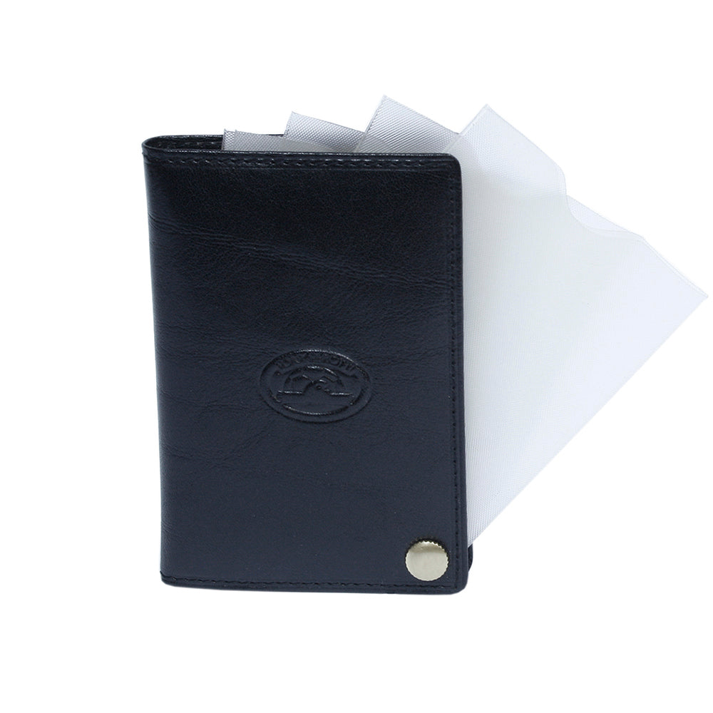 Black leather business card holder with clear plastic sleeves fanned out behind — Tony Perotti Italico 2028 nero
