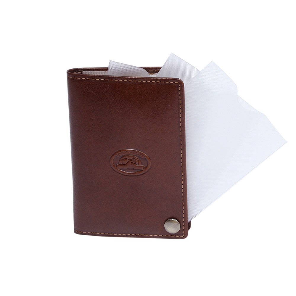 Cognac leather business card holder with clear plastic sleeves fanned out — Tony Perotti Italico 2028 cognac