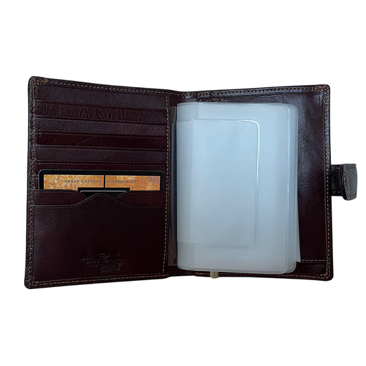 Dark Brown passport wallet Tony Perotti Italico 3274A moro opened flat — six card slots on the left, removable booklet of frosted clear inserts in a transparent sleeve on the right
